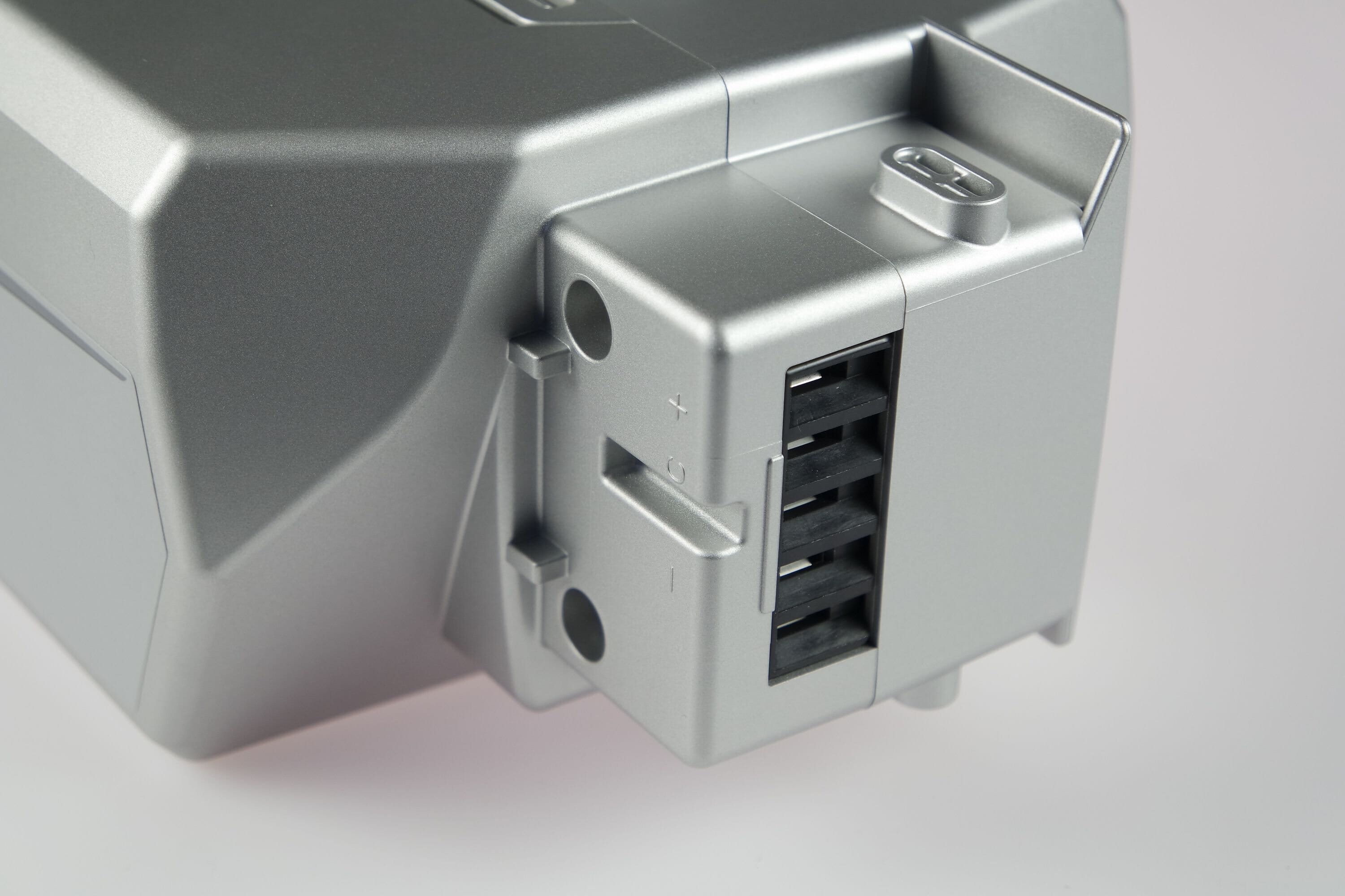 Original Panasonic 36-Volt battery holder with slot between "-" and "C"-contact